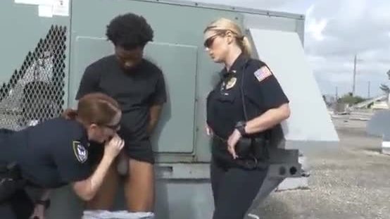 Big boobed uniformed white cops suck black suspect on roof